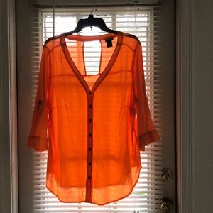 Button down blouse. Cutout neck in back